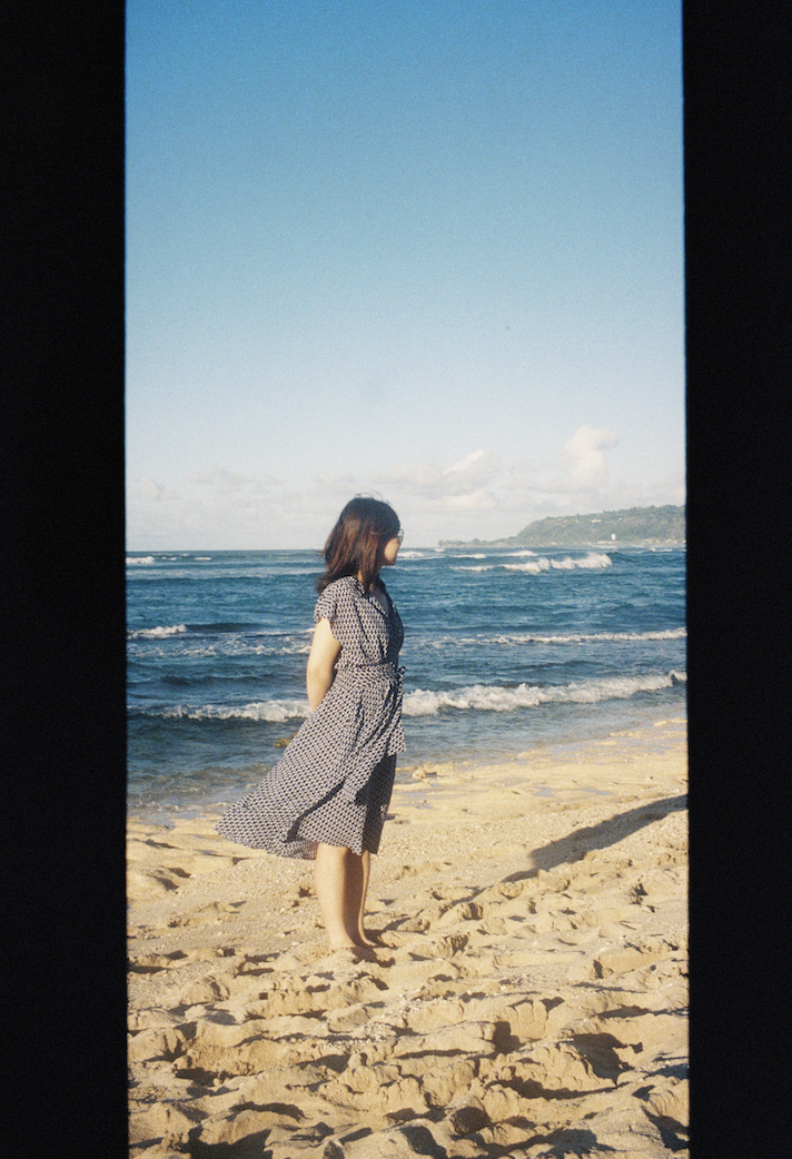 Film photo of Chengzhi Zhang on a beach